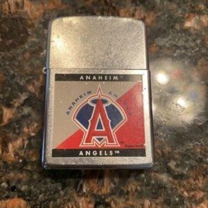 Vintage ANAHEIM ANGELS lighter *uses lighter fluid* silvertone w/ red blue logo